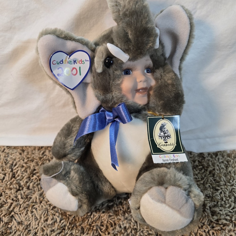 2002 CUDDLE KIDS...AARON‎ ELEPHANT BY GEPPEDDO...PORCELAIN FACE... EYE LASHES